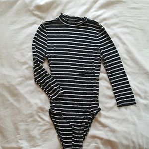 Black and white striped bodysuit.